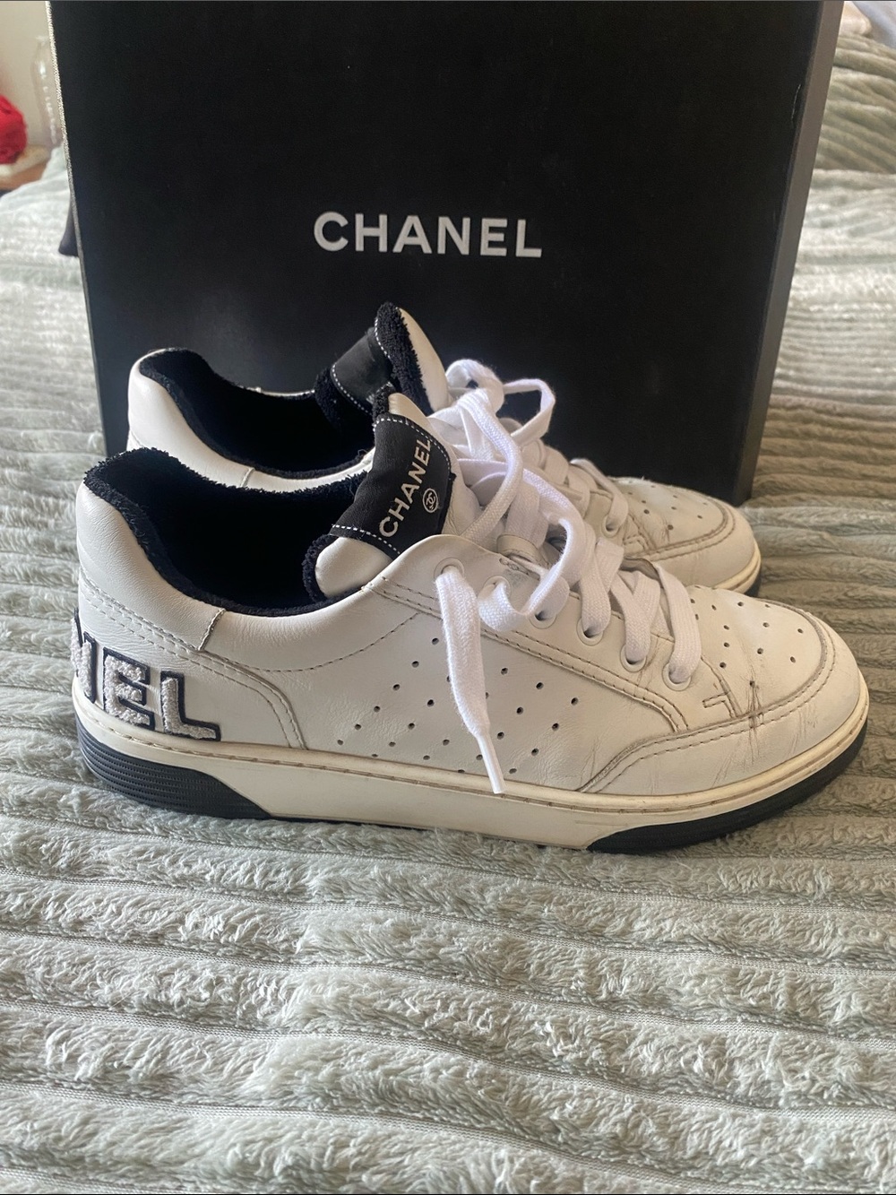 CHANEL White Leather Womens Low-Top Sneakers with Black Accents